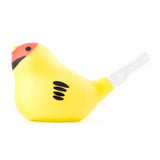 Yellow bird-shaped whistle with a red and black head, three black wing markings, and a clear tail section. It appears playful and whimsical.