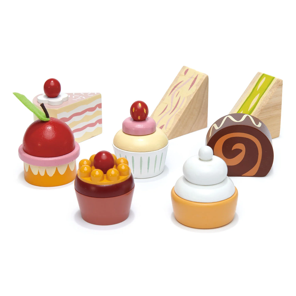 A charming wooden play set featuring a two-tiered stand with bird details, complete with toy cakes and treats for pretend tea parties.