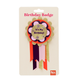 "It's My Birthday!" rosette badge with ribbons packaged on a cream Rex London display card.