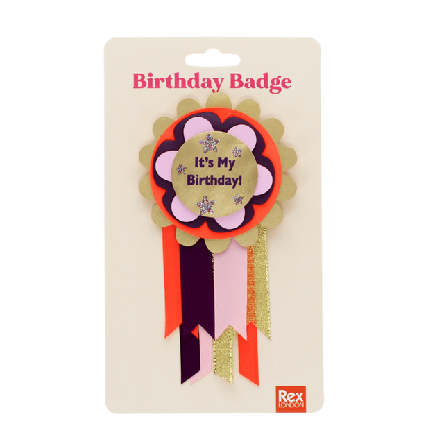"It's My Birthday!" rosette badge with ribbons packaged on a cream Rex London display card.