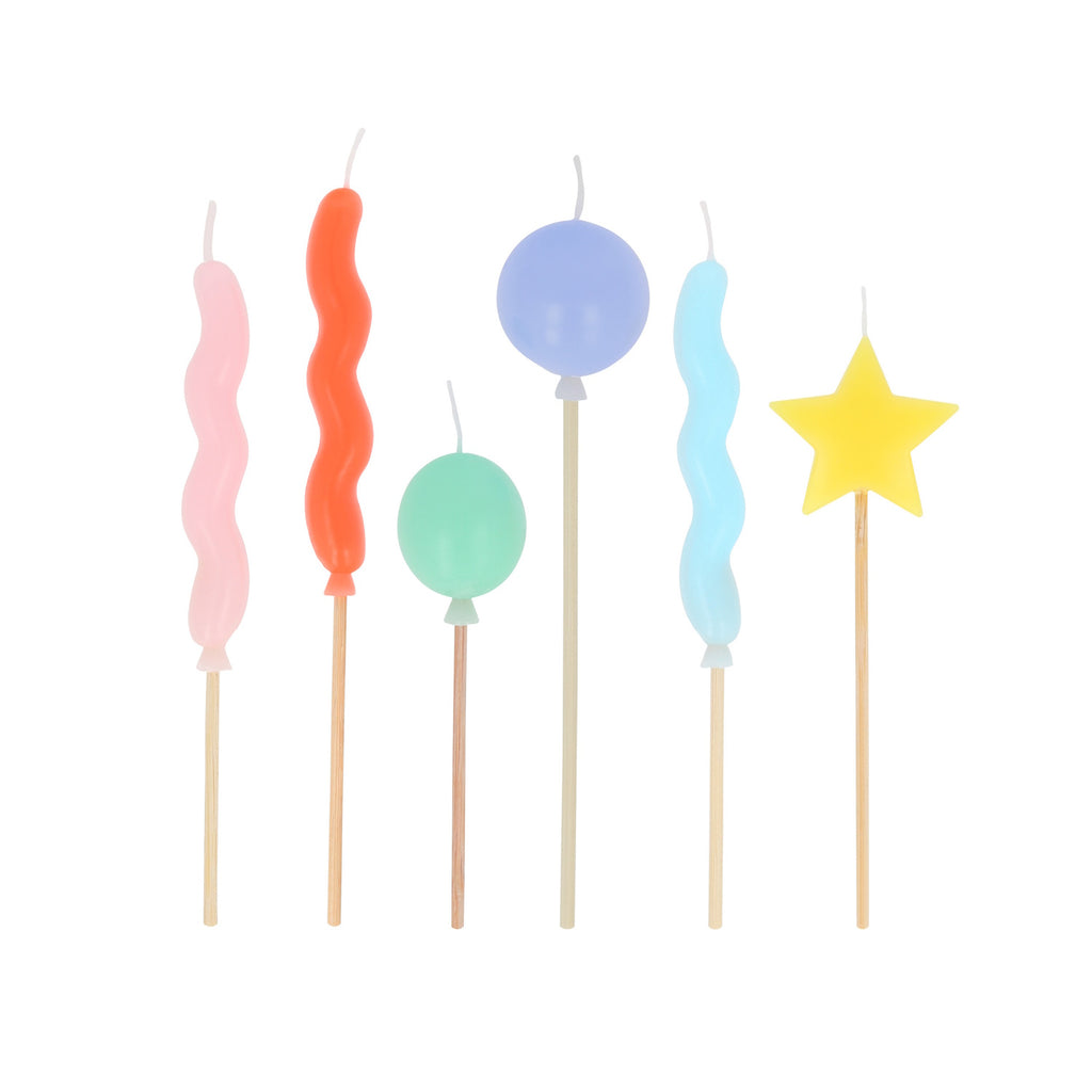 Colorful birthday candles: pink and blue wavy lines, orange wave, green and blue balloons, and a yellow star on sticks. Festive and playful.
