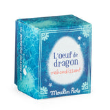 Moulin Roty blue bouncy dragon egg toy packaging box with dragon scale details.