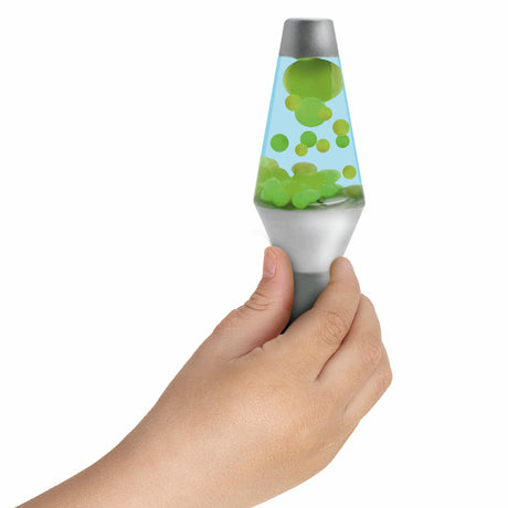 Hand holding a mini green and blue liquid-filled sensory lava lamp toy against a white background.