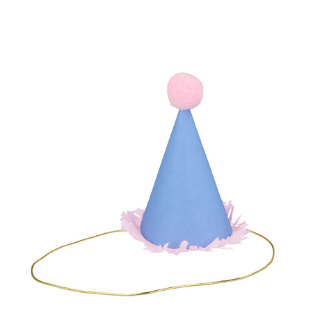 Mini blue party hat with pink pom-pom, fringed base, and gold elastic strap on a white background.