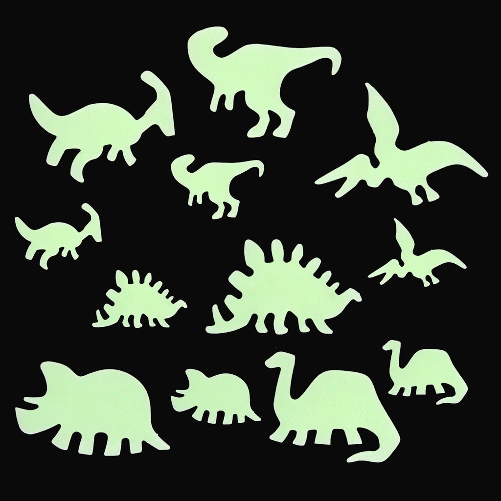 Glow-in-the-dark dinosaur silhouettes on a black background, featuring Triceratops, Stegosaurus, and Pterodactyl, conveying a playful tone.
