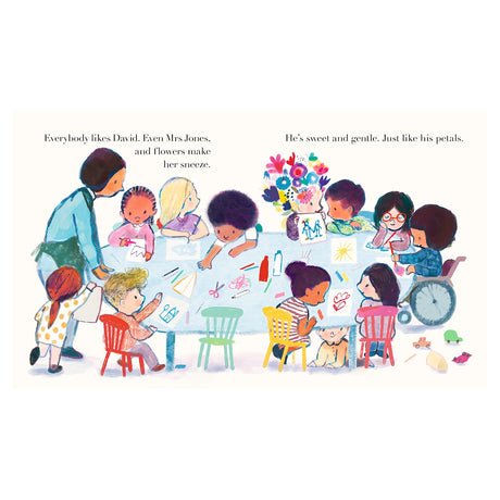 Colorful children's book illustration of a diverse classroom drawing at a table, featuring a boy with flowers in his hair.