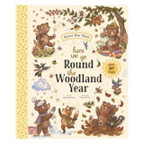 Book cover for 'Here We Go Round the Woodland Year' featuring illustrated woodland animals in four seasons.