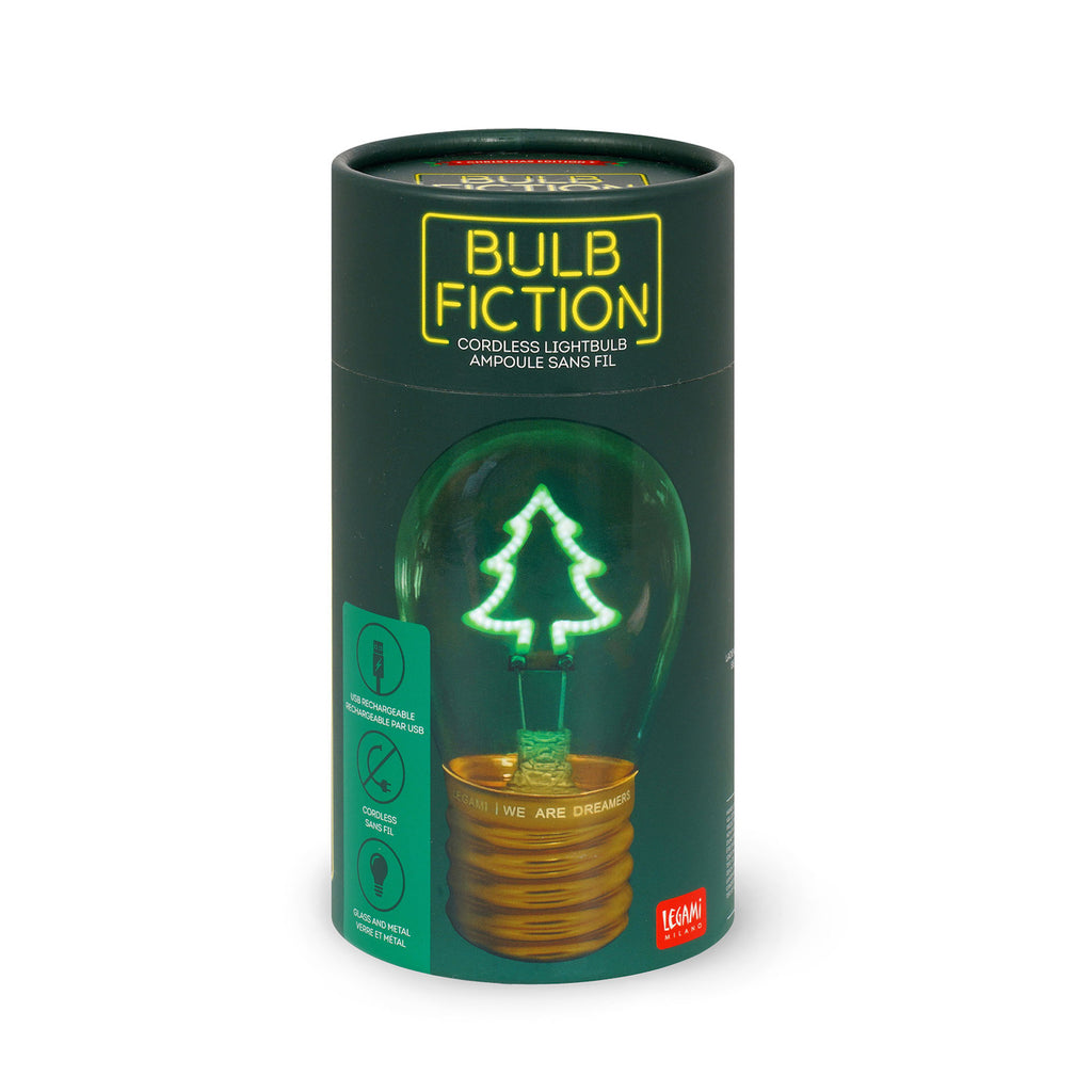 Green cylindrical package labeled "Bulb Fiction" displaying a glowing tree-shaped cordless light bulb with a wooden base, conveying a festive mood.