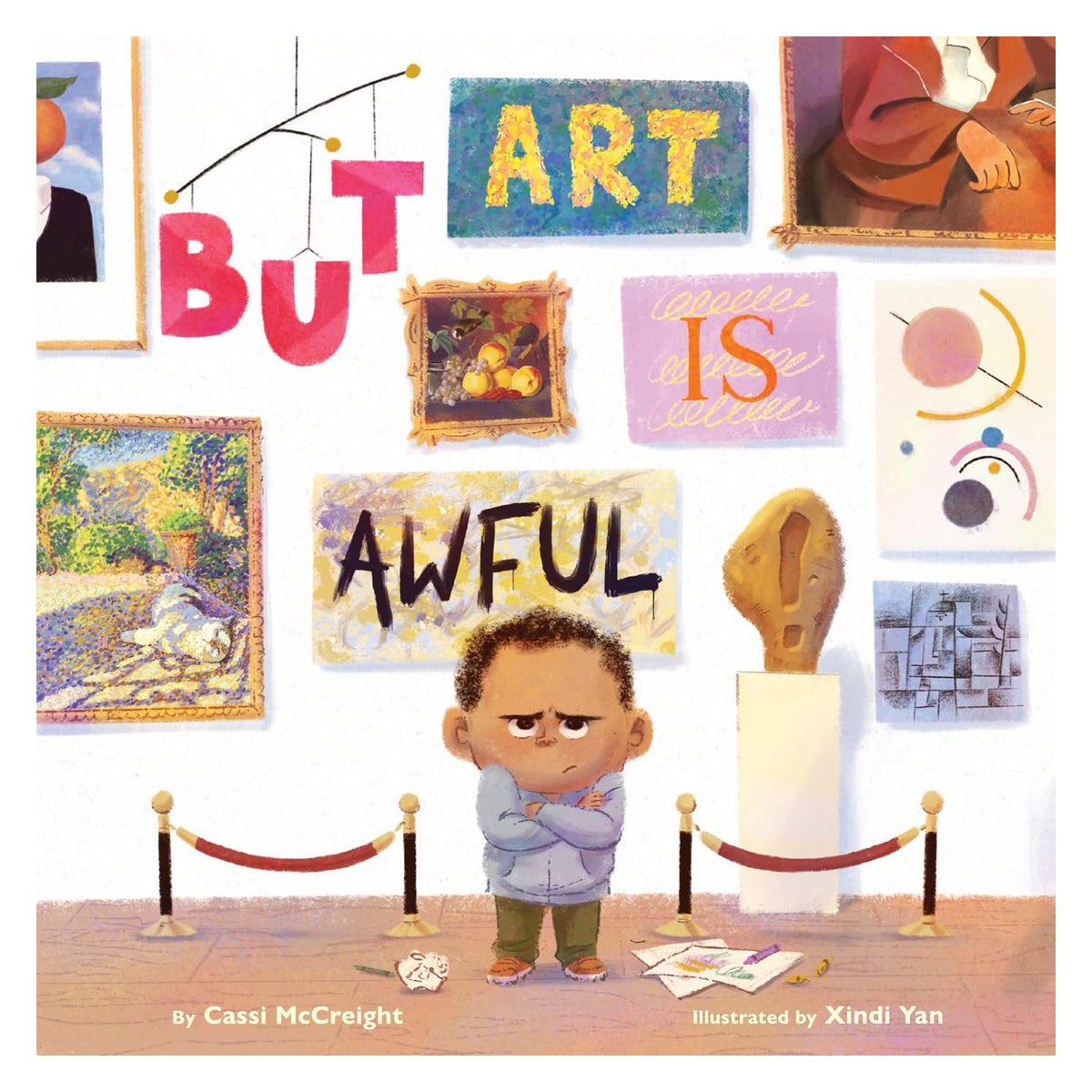 Book cover for 'BUT ART IS AWFUL' showing a grumpy boy with crossed arms standing inside an art gallery.