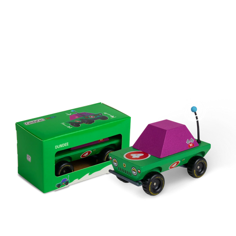 Candylab Toons Dundee wooden adventure truck toy in green and purple with matching green branded box packaging.