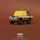 Small wooden toy off-road truck with yellow cab and "Mud Coyote" decals on a brown background. CandyCar Toons logo below.