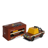 Candylab Mud Coyote wooden toy truck next to its original brown packaging box, featuring a retro off-road design.