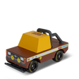 Wooden toy truck "Mud Coyote" by Candylab, featuring a brown body, yellow cab, and black off-road roll bar and tires.