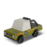 Wooden toy adventure truck in olive green with number 67, white cab, and black roll bar by Candylab Candycar.
