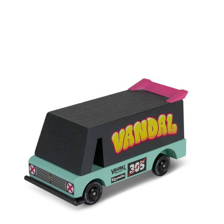 Wooden toy Vandal Van in seafoam green and black with pink spoiler and yellow "Vandal" graffiti text on a white background.