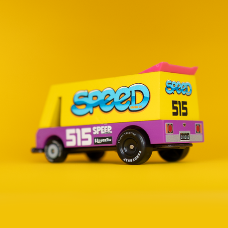 Rear view of a yellow and purple Candycar Toons Vandal van toy with "Speed 515" graphics against a yellow background.