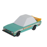 Teal and white Tora Candycar wooden toy racer with yellow spoiler and DRF decals on a white background.