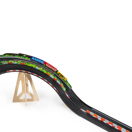 Candylab Roadworks Banks Turn add-on kit featuring a curved black toy track elevated by a wooden support stand.