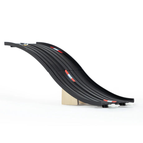 Candylab Roadworks Hop expansion pack toy ramp with black grooved track and wooden support block on white background.
