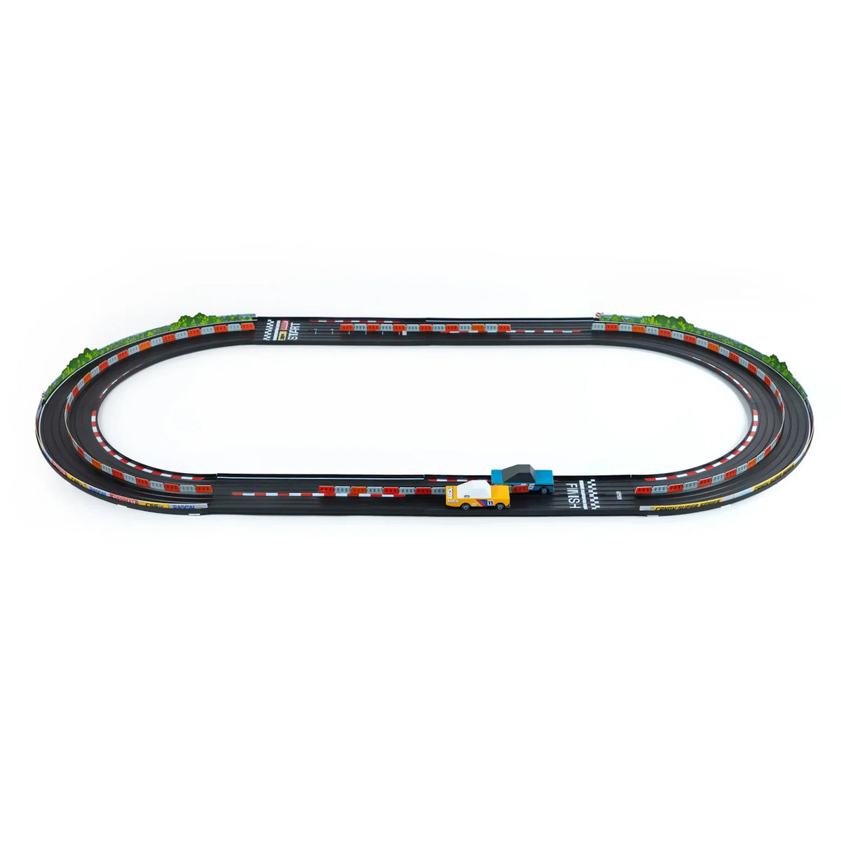 Candylab Roadworks Oval Speedway playset with two wooden toy cars racing on a black track with red and white barriers.