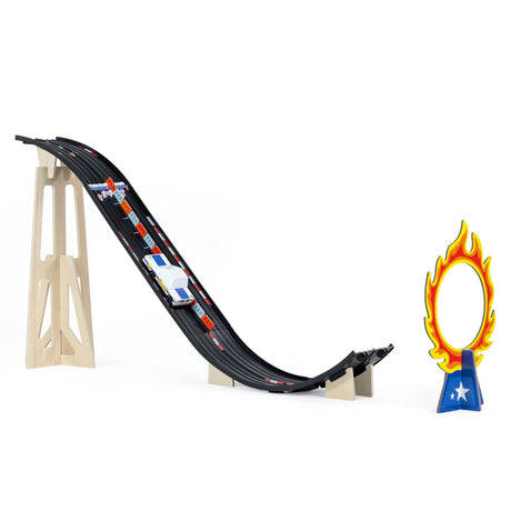 Candylab Roadworks toy car on a black stunt ramp with a ring of fire obstacle, side angle view on white background.
