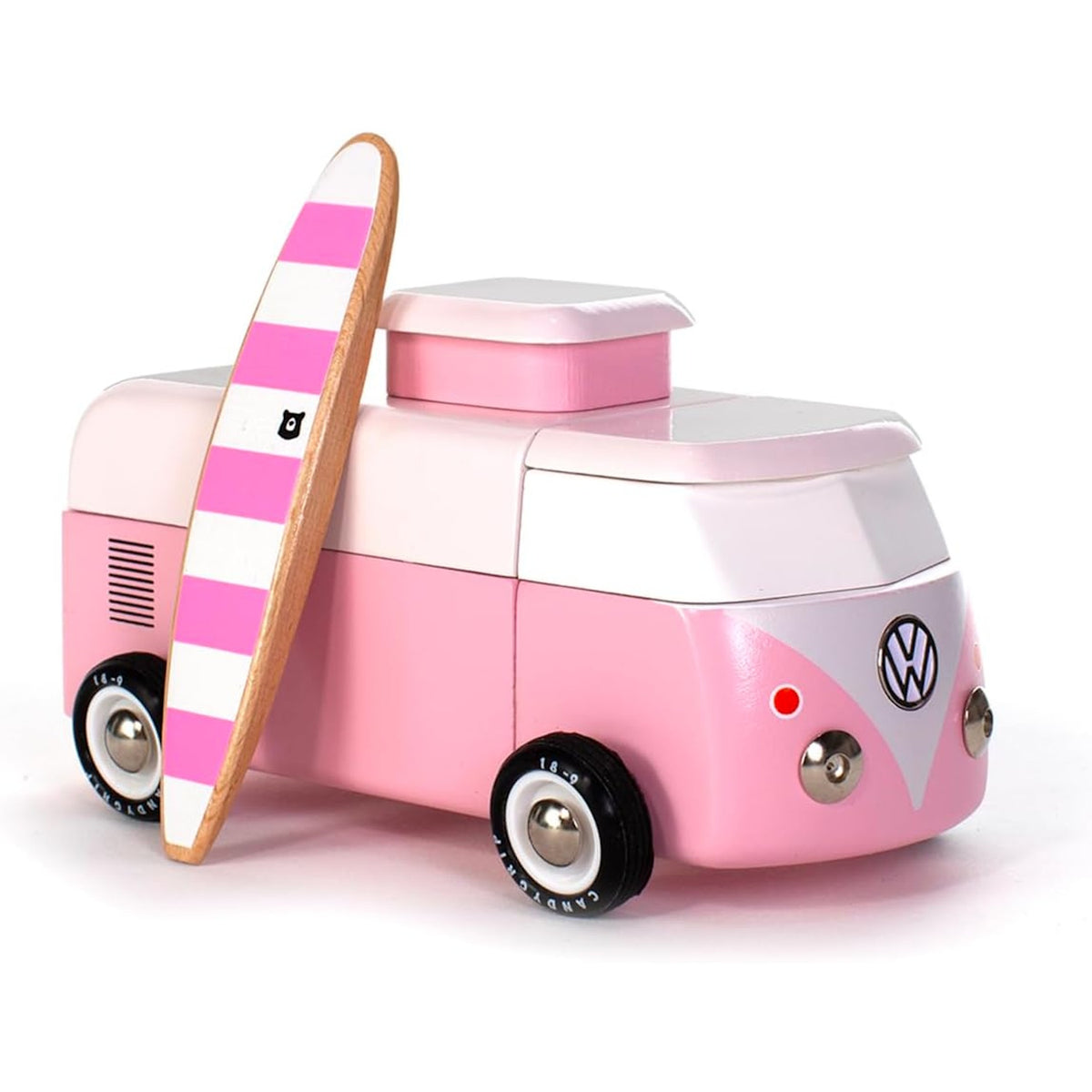 Pink wooden Volkswagen beach bus toy with a matching pink and white striped surfboard.