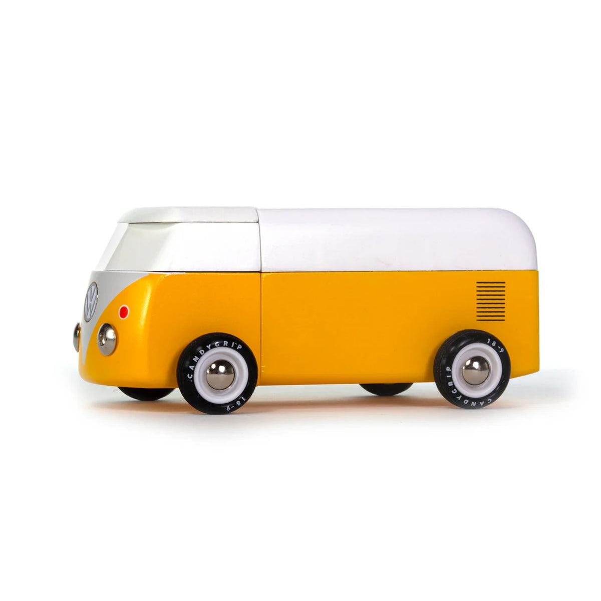 Yellow and white toy Volkswagen beach bus with Candylab Candygrip tires on a solid white background.