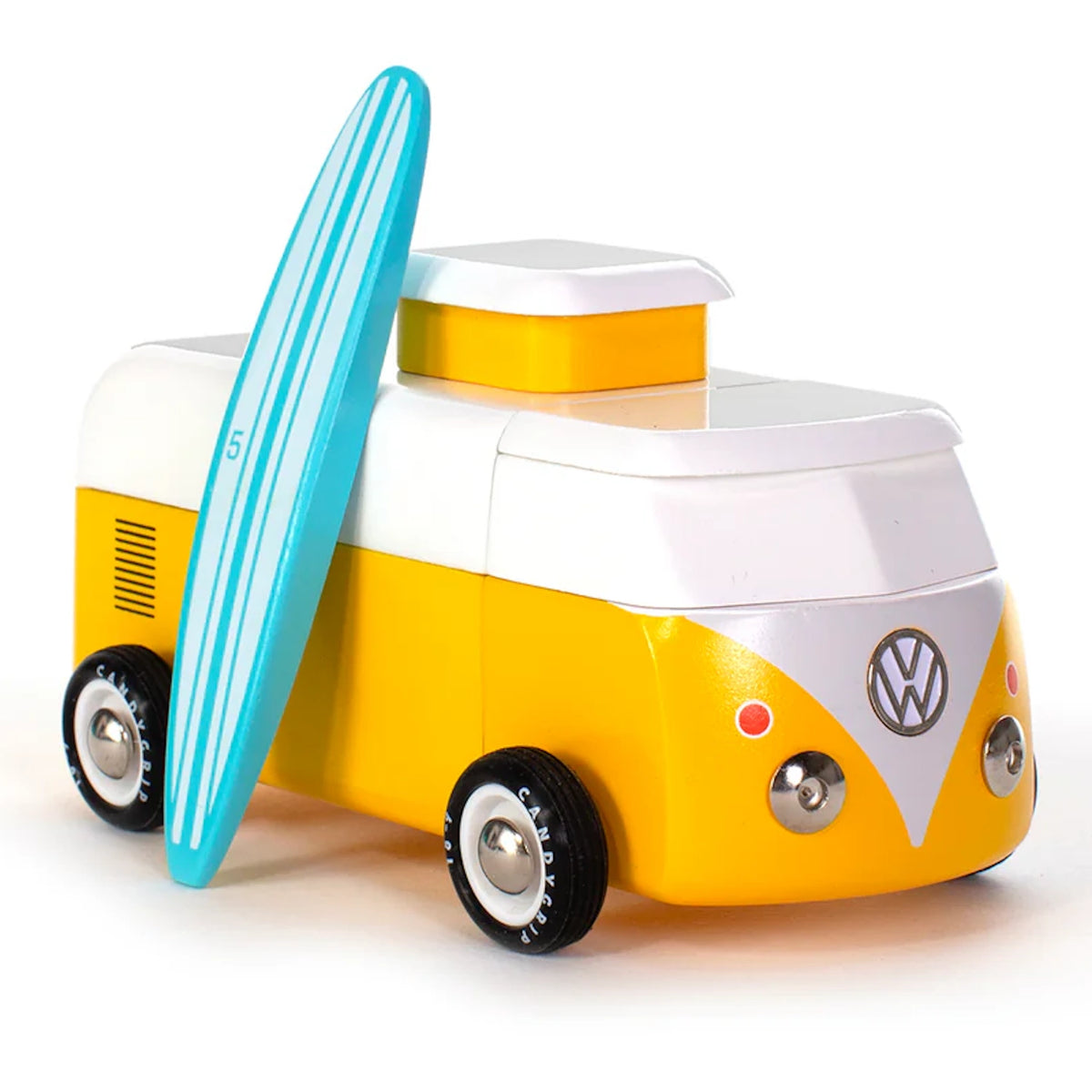 Yellow and white Candylab wooden toy VW beach bus camper with a blue and white striped surfboard.