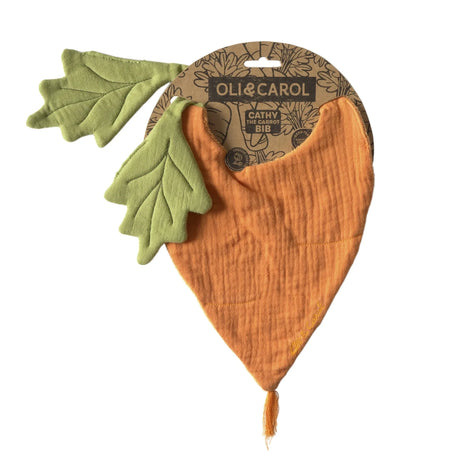 Oli & Carol Cathy the Carrot bib. Orange organic cotton muslin baby bib with green fabric leaves on packaging.