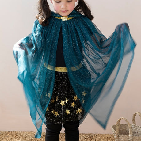 Young girl in a sheer teal glitter cape with gold star accents and a matching star collar clasp.