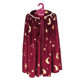 Burgundy velvet children's wizard cape with gold metallic stars and crescent moons hanging on a pink hanger.