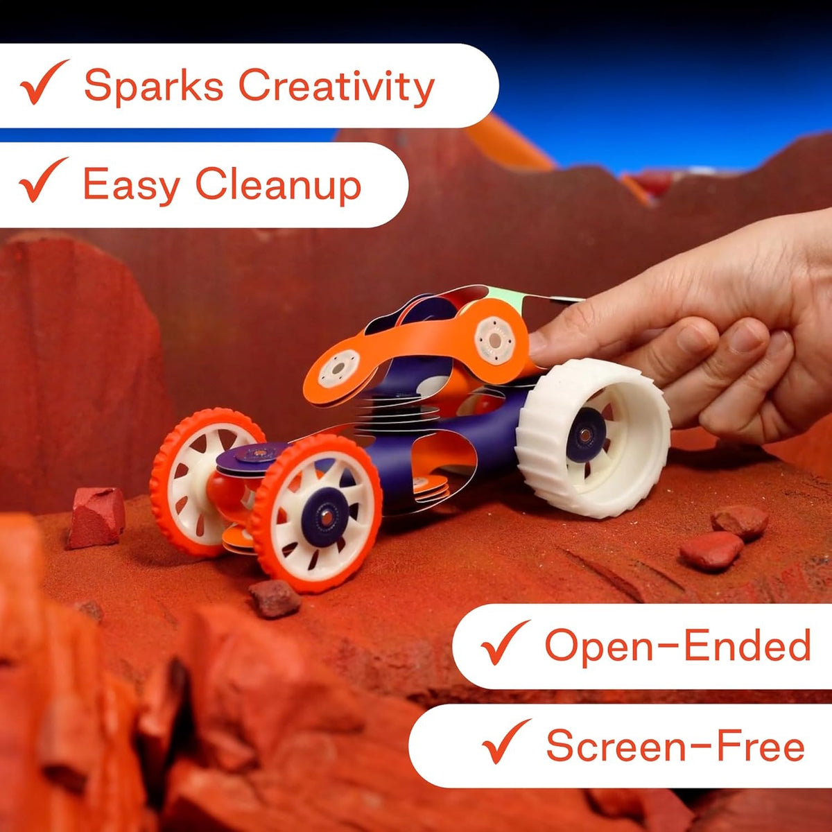 Hand pushing a Clixo toy car on a rocky surface with text highlighting benefits like Sparks Creativity.