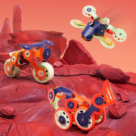 Three colorful Clixo toy vehicles shown on a red rocky landscape, including a drone flying above.