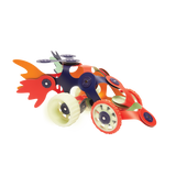 A futuristic toy car built with flexible Clixo magnetic pieces and glowing wheels against a white background.