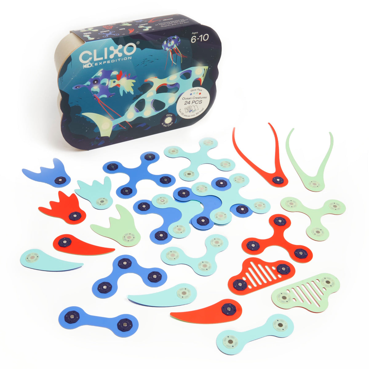 A Clixo Ocean Creatures Glow Pack box sitting next to a spread of 24 colorful, magnetic toy pieces.