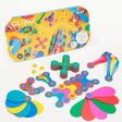 Clixo Rainbow Pack 42-piece box alongside organized stacks of colorful flexible magnetic building pieces.