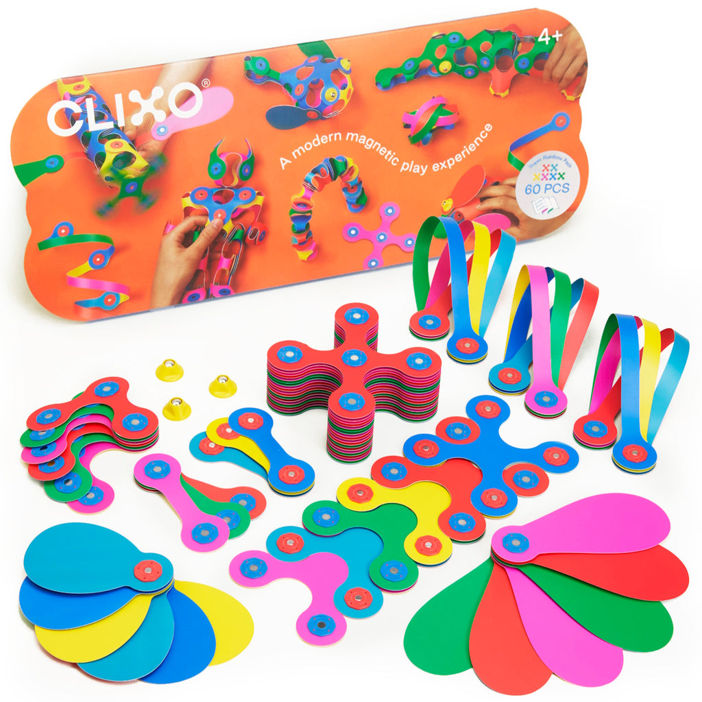 Bright magnetic play set on an orange background featuring colorful geometric shapes and ribbons. Packaging shows creative build examples. Fun and engaging.