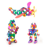 Three rainbow-colored figures, an airplane, a cat, and a robot, built with flexible Clixo magnetic pieces.