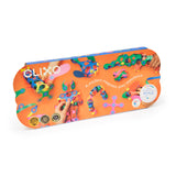Bright orange Clixo Super Rainbow Pack box displaying various colorful flexible magnetic creations.