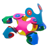 Colorful, flexible magnetic toy pieces connected into a 3D structure on a black background.
