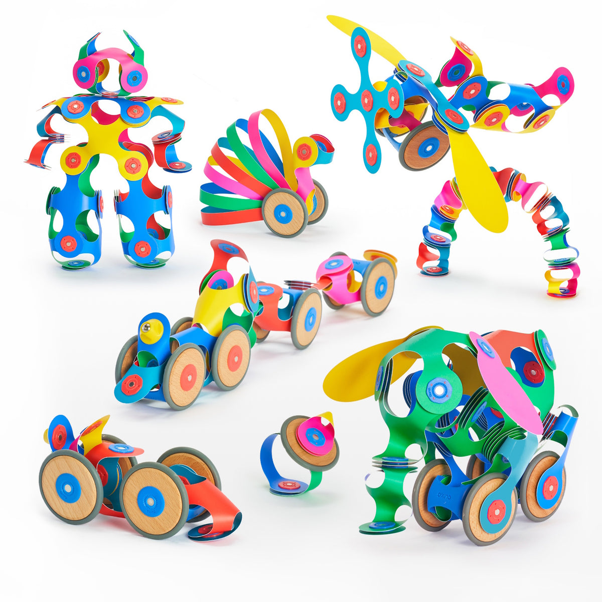 Colorful vehicles, animals, and figures built with magnetic Clixo pieces and wheels on a white background.