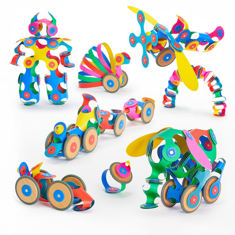 Colorful vehicles, animals, and figures built with magnetic Clixo pieces and wheels on a white background.