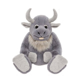 Front view of a plush grey horned creature toy sitting down, showing curved horns, beard, and big foot pads.