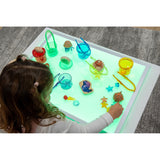 A large, slim LED panel with adjustable color settings, ideal for sensory play, light exploration, and enhancing visual learning activities.