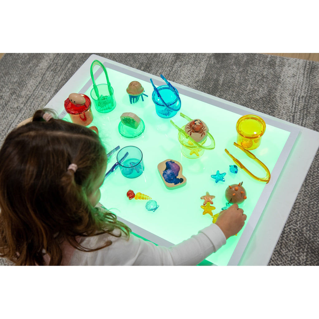 A large, slim LED panel with adjustable color settings, ideal for sensory play, light exploration, and enhancing visual learning activities.