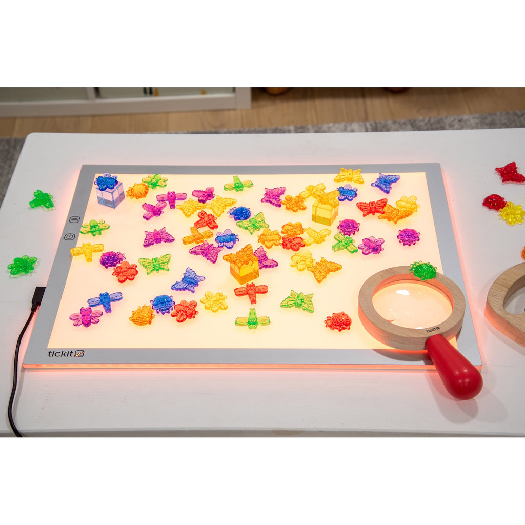 A large, slim LED panel with adjustable color settings, ideal for sensory play, light exploration, and enhancing visual learning activities.