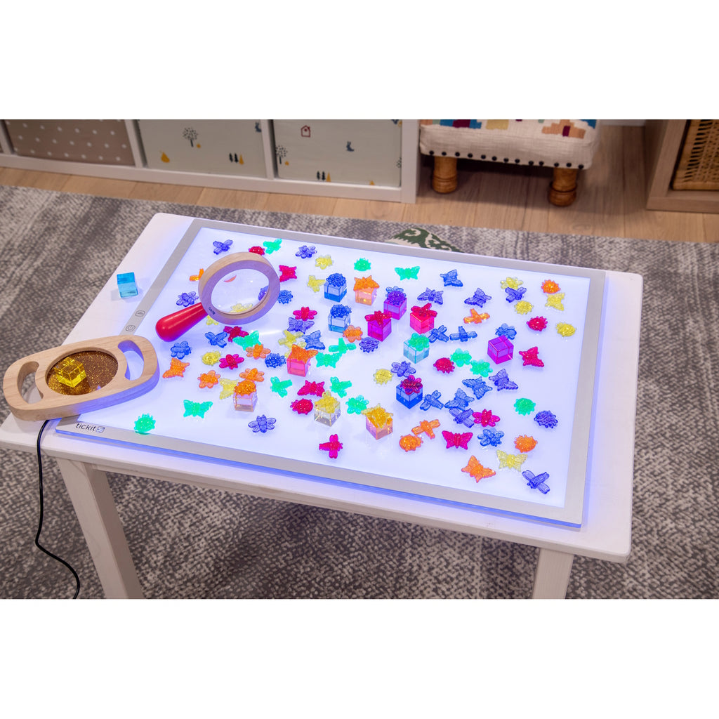 A large, slim LED panel with adjustable color settings, ideal for sensory play, light exploration, and enhancing visual learning activities.