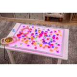 A large, slim LED panel with adjustable color settings, ideal for sensory play, light exploration, and enhancing visual learning activities.