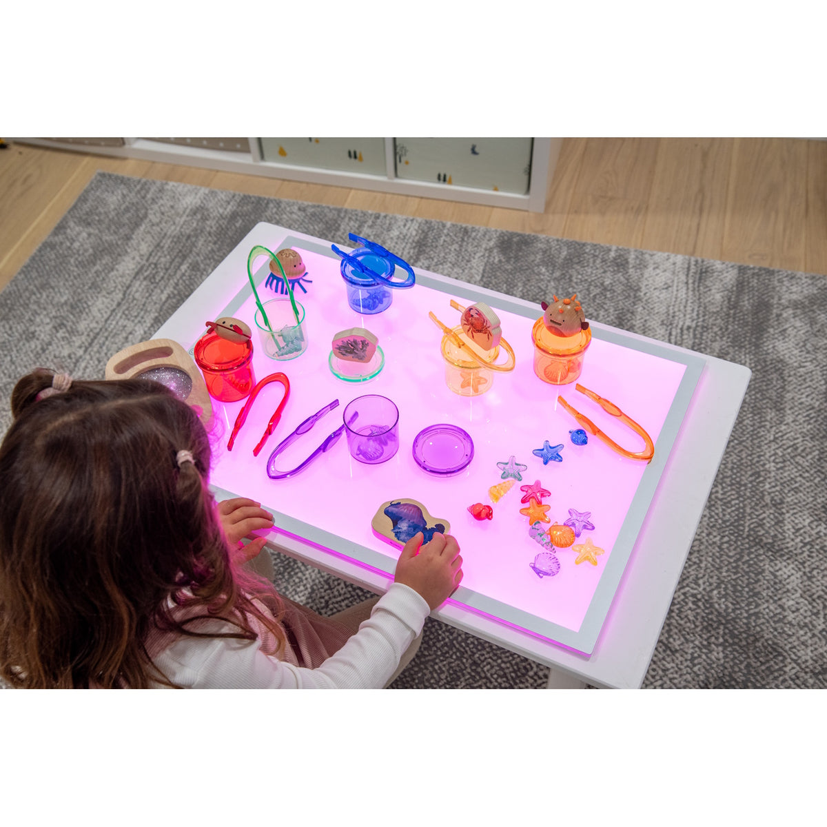 A large, slim LED panel with adjustable color settings, ideal for sensory play, light exploration, and enhancing visual learning activities.