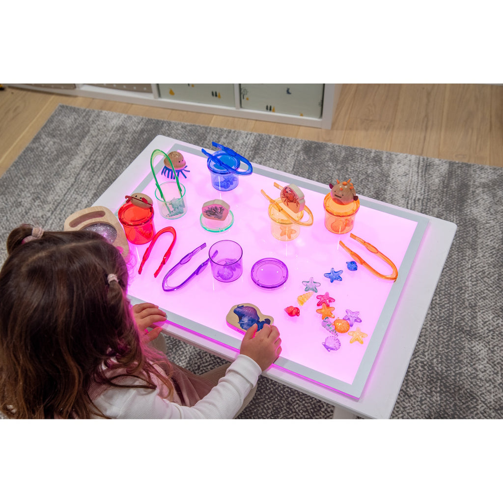 A large, slim LED panel with adjustable color settings, ideal for sensory play, light exploration, and enhancing visual learning activities.